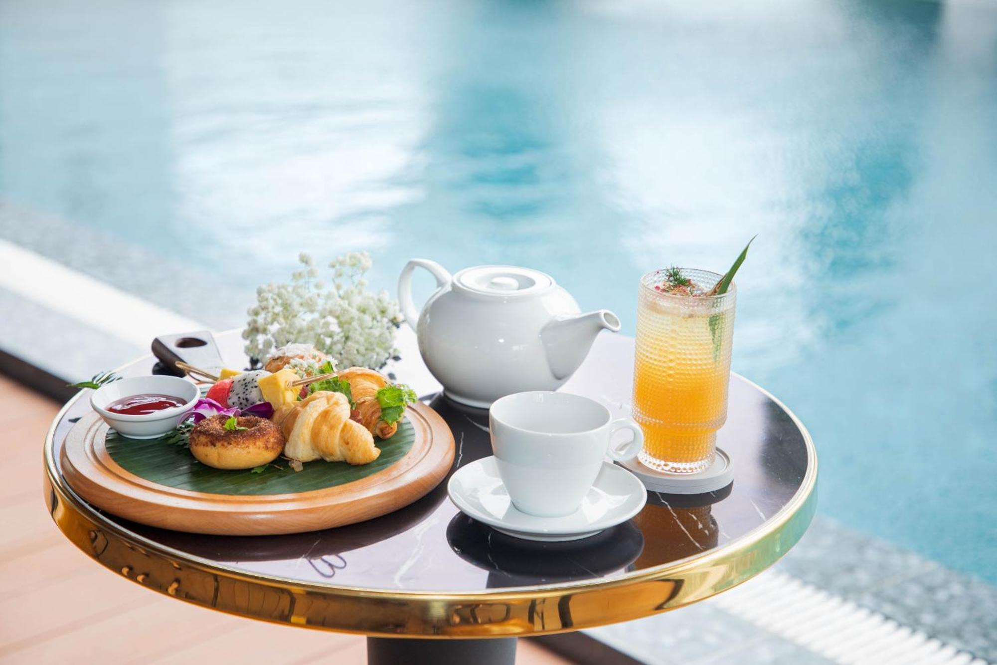 Golden Lotus Hotel Da Nang - Rooftop Bar Sea View מראה חיצוני תמונה